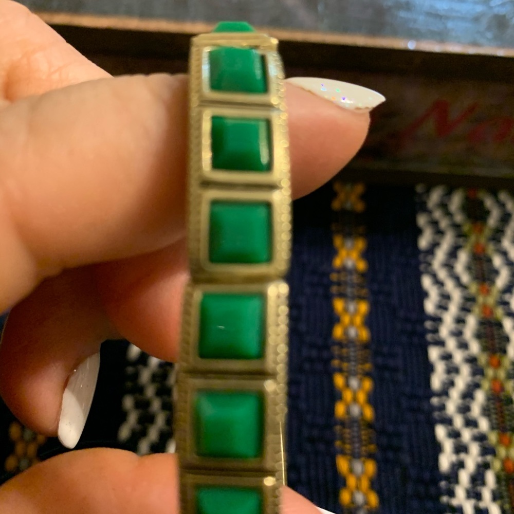 Bracelet gold with green stones
